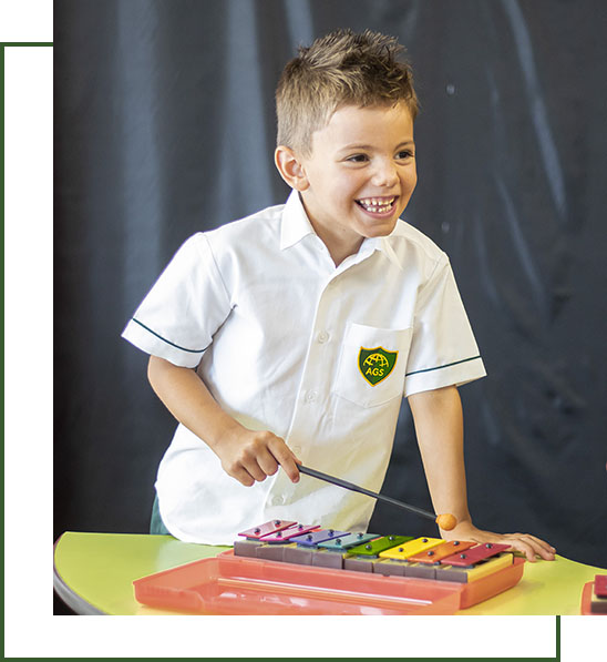 Arcadia pupil playing the keyboard